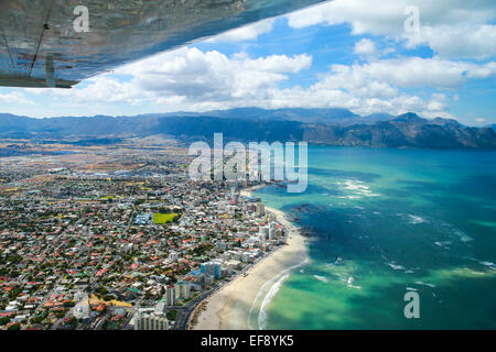 View down the coast from a light aircraft, False Bay, Cape Town, South Africa Stock Photo