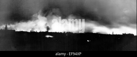 The burning city of Dresden after the bombing attacks by the Allies, the British Royal Airforce and the United States Army Air Forces, in the night between 13 February and 14 February 1945. The picture was taken at the Waltherstraße in Dresden looking at the Ostragehege. At the end of the war in May 1945, one third of all apartments in Dresden were destroyed. According to recent historical investigations 25,000 people were killed by the air raids. Fotoarchiv für Zeitgeschichte - NO WIRE SERVICE Stock Photo