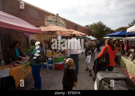 Shoppers at a Farmer's Market. Stock Photo