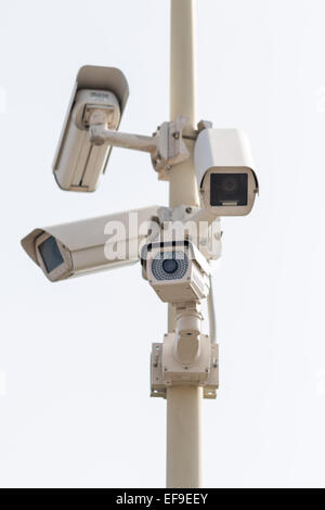 Group of four cameras on a pole Stock Photo