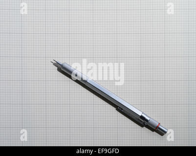 vertical graph paper and mechanical pencil Stock Photo