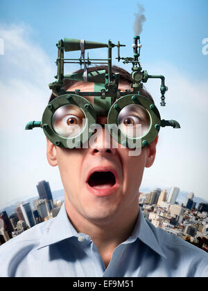 Fantasy image of man standing in front of cityscape wearing steam powered eyeglasses Stock Photo