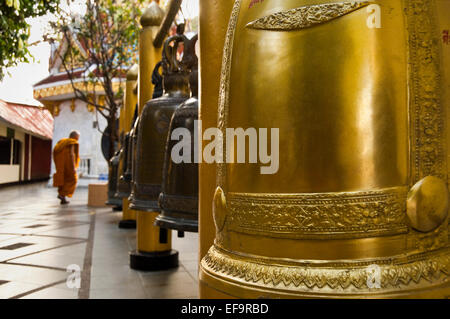 Horizontal view of Buddhist prayer bells hanging at Wat Doi Suthep in Chiang Mai. Stock Photo