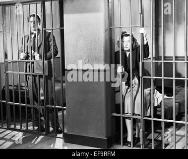 RICHARD CARLSON, JEAN ROGERS, A STRANGER IN TOWN, 1943 Stock Photo