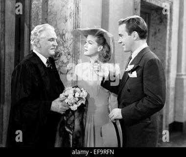 FRANK MORGAN, JEAN ROGERS, RICHARD CARLSON, A STRANGER IN TOWN, 1943 Stock Photo