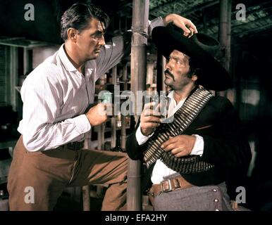 ROBERT MITCHUM, JOSE TORVAY, BANDIDO, 1956 Stock Photo: 78282899 - Alamy