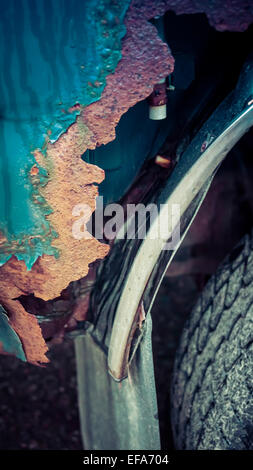 Rust on wheel well of an old truck close up. Stock Photo