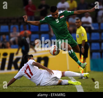 Newcastle, Australia. 30th Jan, 2015. Ahmed Yaseen Gheni (R) of Iraq dribbles during the third and fourth final match at the 2015 AFC Asian Cup in Newcastle, Australia, Jan. 30, 2015. Credit:  Guo Yong/Xinhua/Alamy Live News Stock Photo