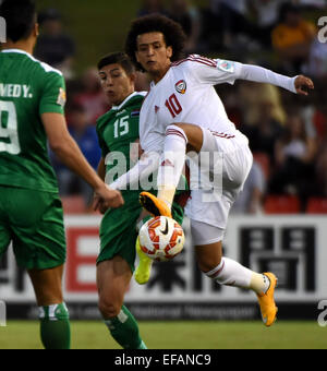 Newcastle, Australia. 30th Jan, 2015. Omar Abdulrahman (R) of the United Arab Emirates competes with Dhurgham Ismael Dawood (M) of Iraq during the third and fourth final match at the 2015 AFC Asian Cup in Newcastle, Australia, Jan. 30, 2015. Credit:  Guo Yong/Xinhua/Alamy Live News Stock Photo