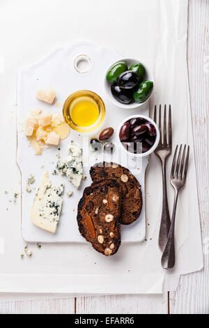 Cheese appetizer with honey and fruit bread Stock Photo