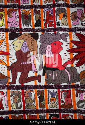 Modern Guatemalan Cloth Embroidered With Mayan Gods and Glyphs Stock Photo