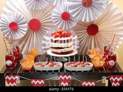 Valentine's Day party table with red velvet cake Stock Photo