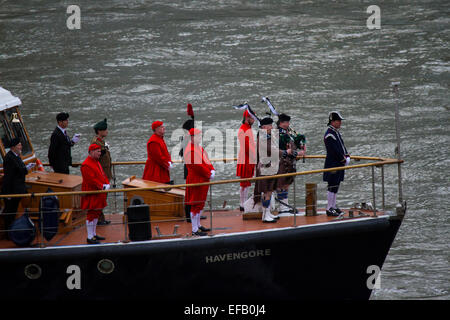 London, UK. 30th Jan, 2015. Scottish Pipers aboard Havengore, part of the flotilla commemorating the 50th Anniversary of Winston Churchill's funeral, London. Credit:  Samuel Bay/Alamy Live News Stock Photo