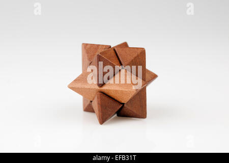 Wood puzzle in the shape of a star Stock Photo