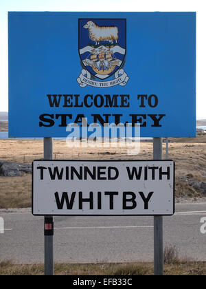 The welcome sign at Stanley, Falkland Islands, reminding that the town is twinned with Whitby in North Yorkshire, England Stock Photo