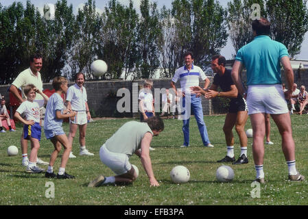 Former Leeds United and England footballer Paul Reaney coaching football at a Pontins holiday camp. England. UK. Circa 1980s