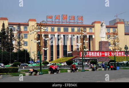 Chengdu,China: Sichuan Science and Technology Museum and Chairman Mao Zedong statue in Tianfu Square Stock Photo