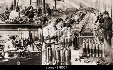 Women manipulating lathes and testing results in a French shell factory during World War One. Stock Photo