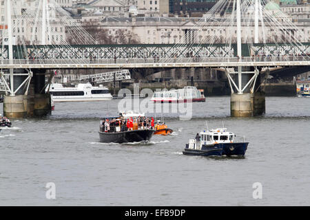 London, UK. 30th January, 2015. The funeral  of Sir Winston Churchill was recreated  using  the boat Havengore which carried his body on the River Thames  ending in wreath  laying  ceremony attended by members of the Churchill family opposite the place of Westminster to mark the 50th anniversary  the British war time leaders death. Credit:  amer ghazzal/Alamy Live News Stock Photo