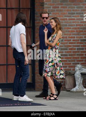 Alexa Chung seen wearing a floral knee length dress in the East Village  Featuring: Alexa Chung Where: New York City, New York, United States When: 28 Jul 2014 Stock Photo