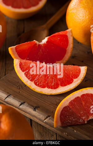 Healthy Organic Red Ruby Grapefruit on a Background Stock Photo