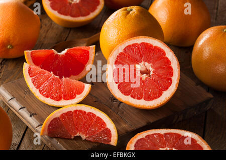 Healthy Organic Red Ruby Grapefruit on a Background Stock Photo