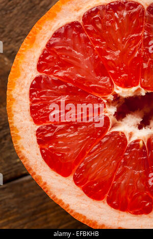 Healthy Organic Red Ruby Grapefruit on a Background Stock Photo