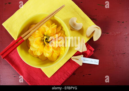 Happy Chinese New Year celebration party table on red wood background. Stock Photo