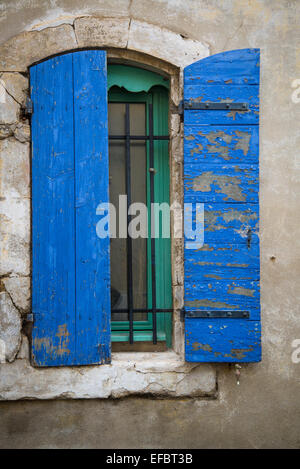 Blue window shutters, Arles, France Stock Photo