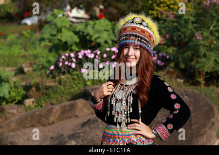 Traditionally dressed Mhong hill tribe woman in the garden at mountain Stock Photo