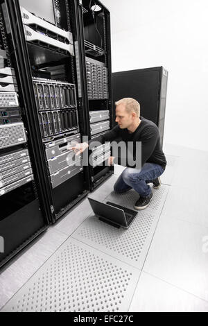 It engineer working in datacenter Stock Photo