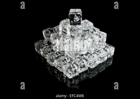 Ice cubes arranged on a black background Stock Photo - Alamy