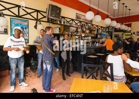 Cuba Old Havana La Habana Vieja Calle Obispo typical Cuban bar La Dichosa band singer singers music song songs dancer dancers Stock Photo