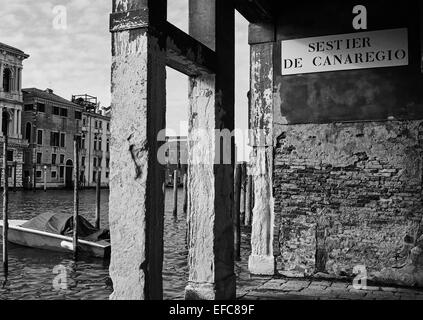 Crumbling building by the edge of the grand canal in the district of Canaregio Venice Veneto Italy Europe Stock Photo