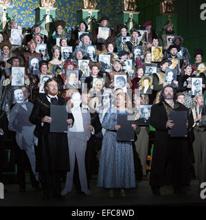 London, UK. 30 January 2015. At the end of the opera, the 110-strong cast hold up pictures of famous German speakers as an homage to Wagner. Richard Wagner's opera 'The Mastersingers of Nuremberg'  (Die Meistersinger von Nürnberg) is performed live on stage during the dress rehearsal with English National Opera Music Director Edward Gardner leading the ENO Orchestra and Chorus. Directed by Richard Jones with with leads played by Gwyn Hughes Jones as Walter von Stolzing, Rachel Nicholls as Eva Pogner, Madeleine Shaw as Magdalene, Nicky Spence as David (Hans Sachs' apprentice), Iain Paterson as Stock Photo