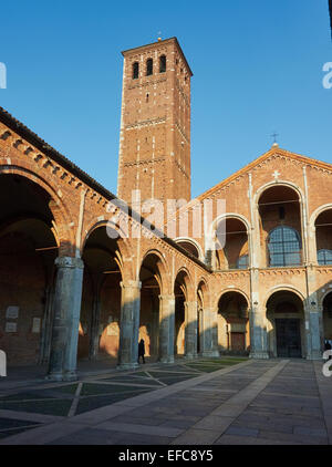 Porticoed atrium courtyard and bell tower of Romanesque Sant' Ambrogio Basilica Milan Lombardy Italy Europe Stock Photo