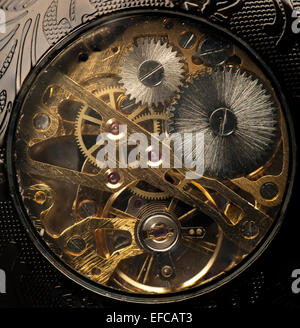 Macro Close up of the inner workings of a pocket watch, steampunk Stock Photo