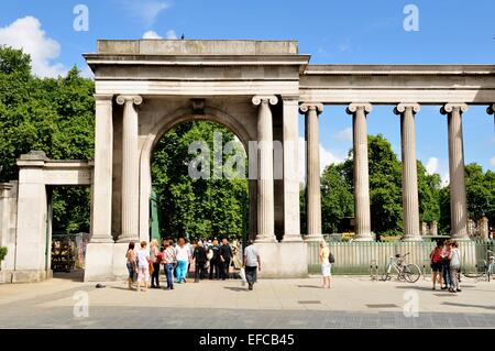 LONDON, UK - JULY 9, 2014: Tourists enter the famous Hyde Park in London. Stock Photo