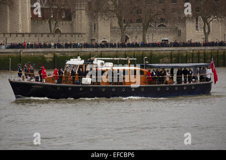 London, UK. 30th Jan, 2015. Crowds of people in front of the Tower of London watch as the Havengore passes upstream towards Westminster Credit:  Emma Durnford/Alamy Live News Stock Photo
