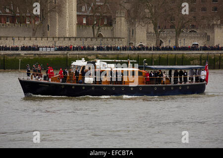 London, UK. 30th Jan, 2015. Crowds of people in front of the Tower of London watch as the Havengore passes upstream towards Westminster Credit:  Emma Durnford/Alamy Live News Stock Photo