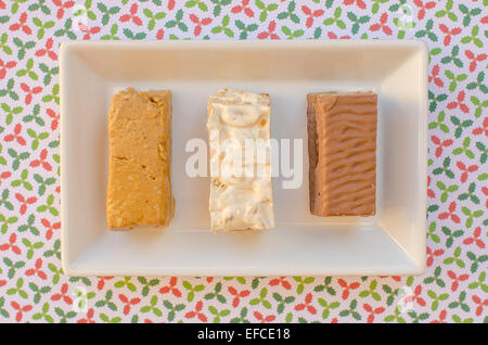 nougat, a typical dessert of Christmas in Spain. Soft, hard and chocolate nougat. Stock Photo