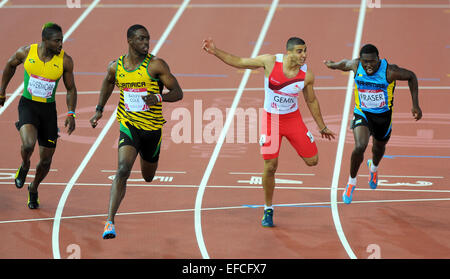 Jamaica's Kemar Bailey-Cole takes Commonwealth Games gold in the 100 metres final ahead of England's Adam Gemili at the Commonwealth Games, Glasgow, Scotland  Featuring: Kemar Bailey-Cole,Adam Gemili Where: Glasgow, United Kingdom When: 28 Jul 2014 Stock Photo