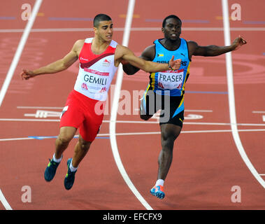 Jamaica's Kemar Bailey-Cole takes Commonwealth Games gold in the 100 metres final ahead of England's Adam Gemili at the Commonwealth Games, Glasgow, Scotland  Featuring: Adam Gemili Where: Glasgow, United Kingdom When: 28 Jul 2014 Stock Photo