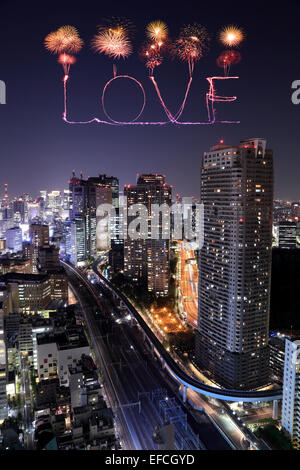 Love sparkle Fireworks celebrating over Tokyo cityscape at night, Japan Stock Photo