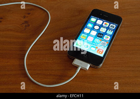 iPhone charging Stock Photo