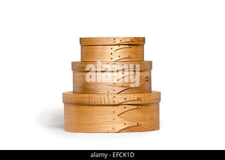 Collection of three hand-crafted shaker boxes.  Stacked and isolated on white. Stock Photo