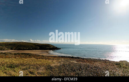 Manorbier, Pembrokeshire, Wales has a large beautiful sweeping bay and tourist attraction beneath open skies. Stock Photo