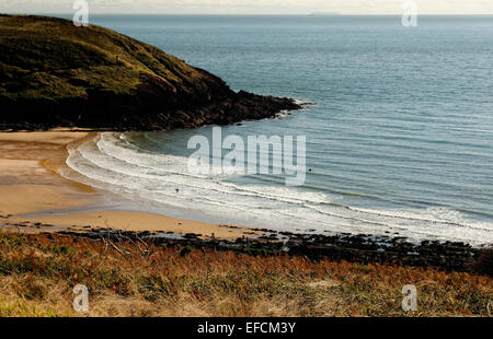 Manorbier, Pembrokeshire, Wales has a large beautiful sweeping bay and tourist attraction beneath open skies. Stock Photo