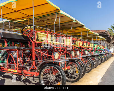 Quad Bikes for rent parked in a line in Kos town - Kos Island Stock