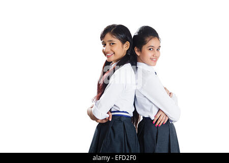 2 indian school girls students standing pose Stock Photo